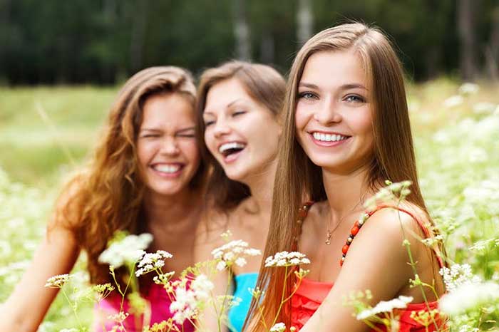 3 girls smiling