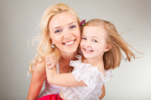 Mom and Daughter smiling